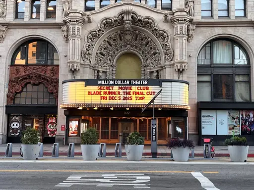 A marquee for Million Dollar Theater. The marquee itself says Secret Movie Club, the group organizing the screening. The movie itself is Blade Runner: The Final Cut.