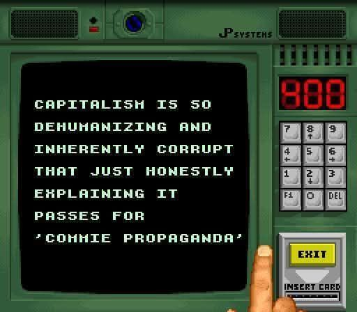 The image is of a monitor and keypad pixelated as if from an '80s video game. The text on the monitor reads "capitalism is so dehumanizing an inherently corrupt that just honestly describing it passes for 'commie propaganda'".