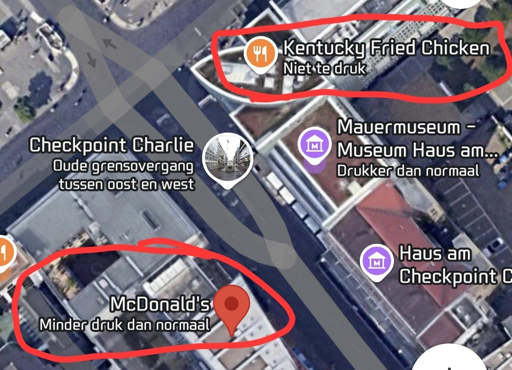 Google Maps screenshot, showing a KFC and McDonald's next to Checkpoint Charlie in Berlin on opposite sides of it